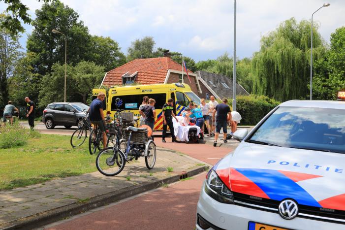 Driewieler vliegt uit de bocht