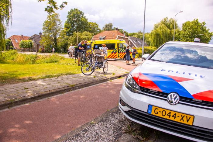 Driewieler vliegt uit de bocht
