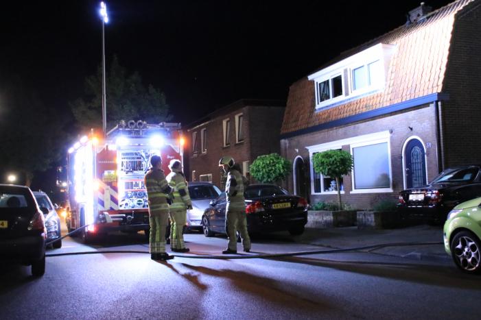 Buitenbrand achter woning