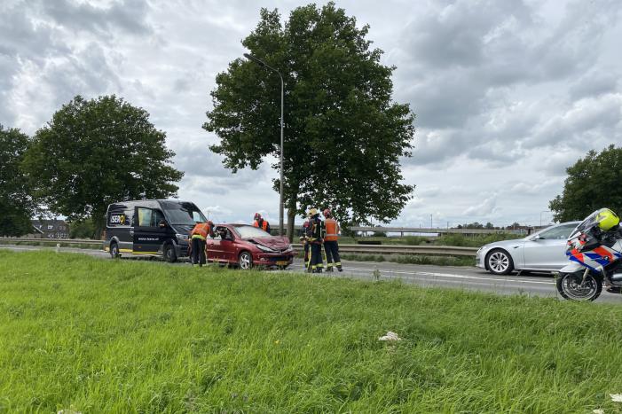 Brand in auto na aanrijding