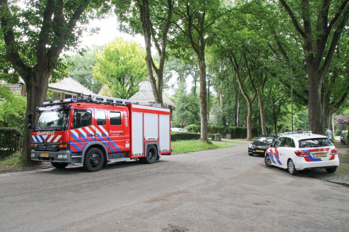 Trap van woning vat vlam door verfbrander
