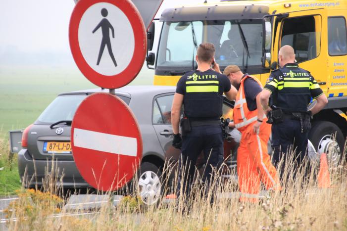 Politieauto ramt personenauto, inzittenden aangehouden