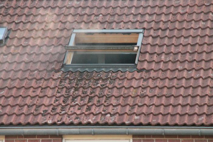 Vrouw gewond bij woningbrand