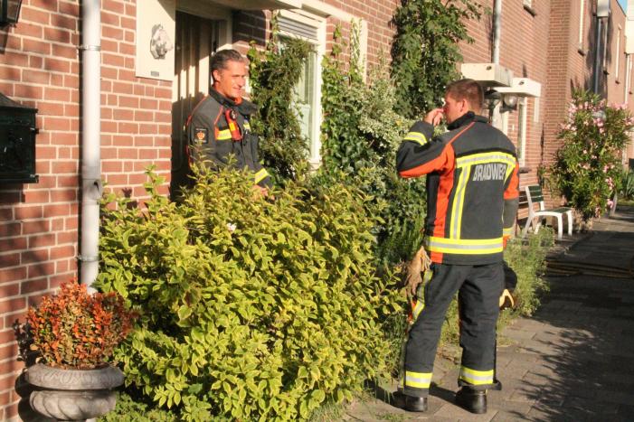 Vrouw gewond bij woningbrand