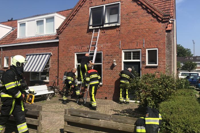 Alerte buurtbewoners reageren op brandalarm