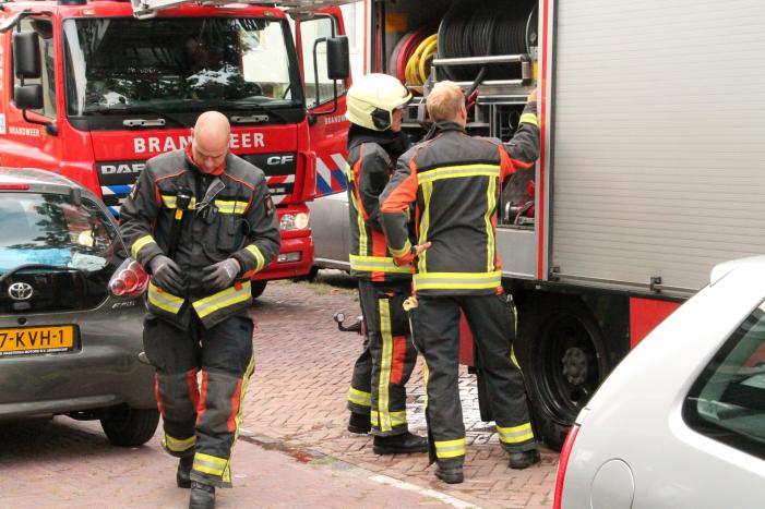 Brand in keuken van flatwoning
