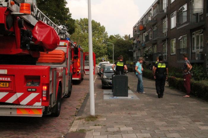 Brand in keuken van flatwoning