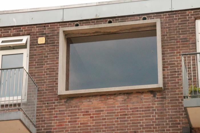 Brand in keuken van flatwoning