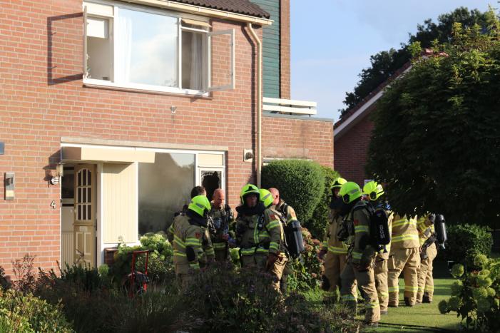 Veel rook bij woningbrand