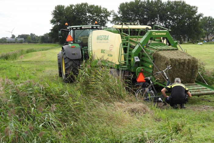 E-biker komt in botsing met grootpakpers