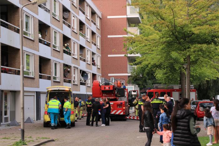 Brand op balkon, vrouw gewond