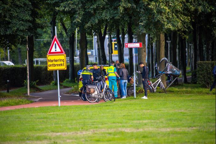 Vrouw gewond na botsing met scooterrijder