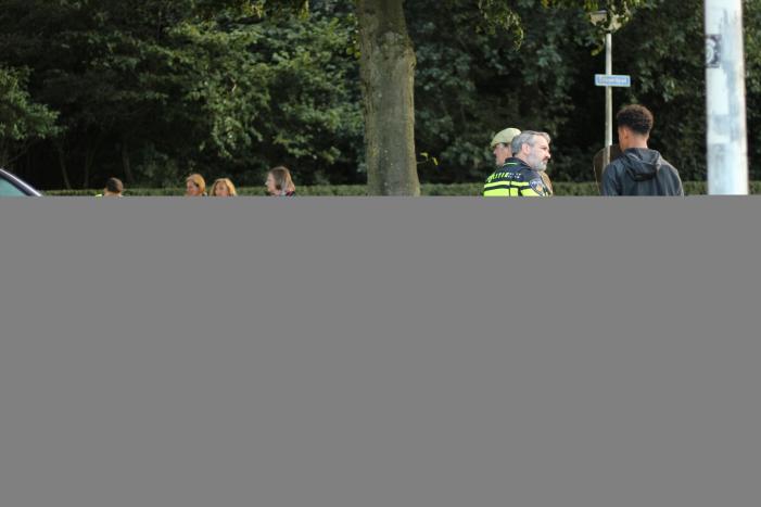 Vrouw gewond na botsing met scooterrijder