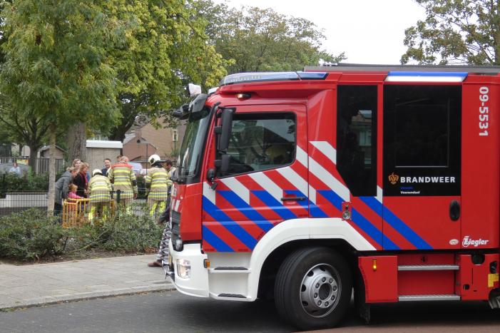 Kindje vast in speeltoestel