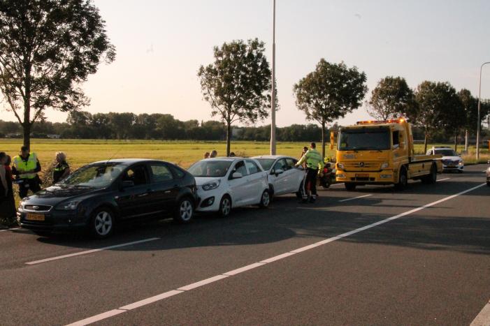 Forse schade na aanrijding met drie auto's