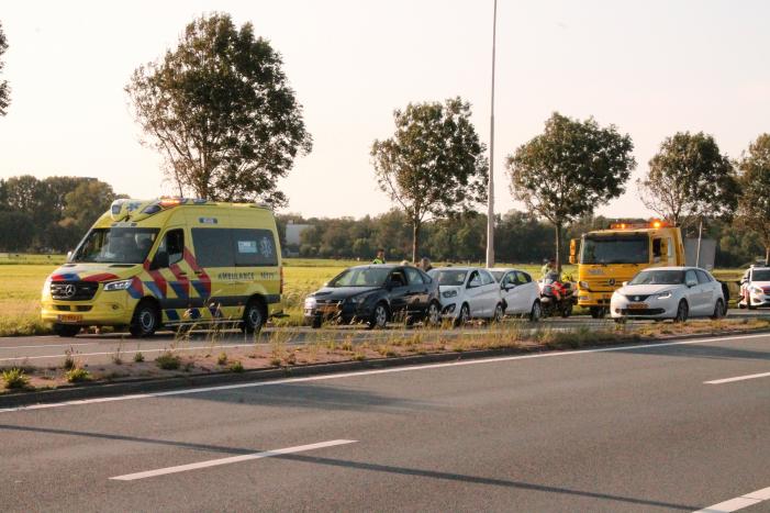 Forse schade na aanrijding met drie auto's