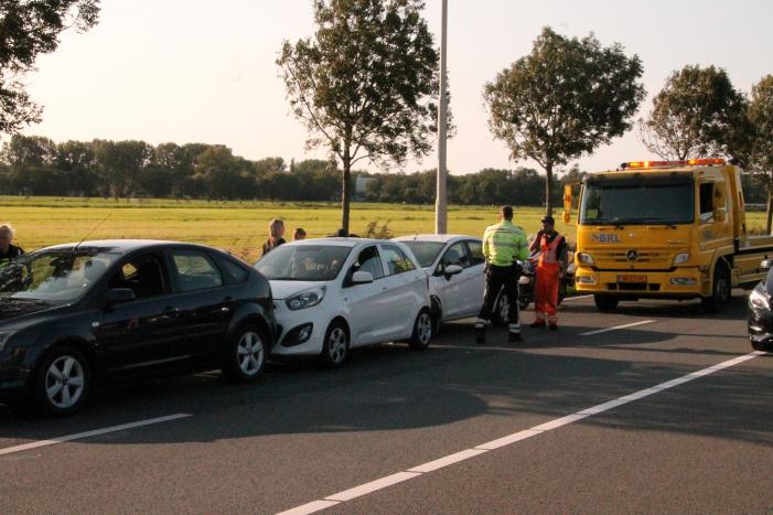 Forse schade na aanrijding met drie auto's