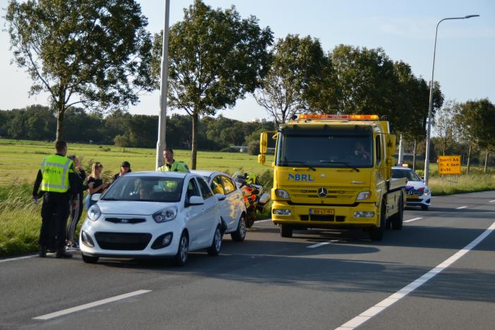 Forse schade na aanrijding met drie auto's