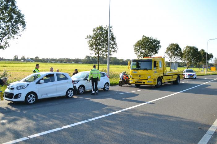 Forse schade na aanrijding met drie auto's
