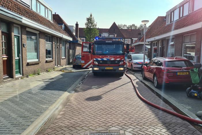 Brand in achtertuin van woning