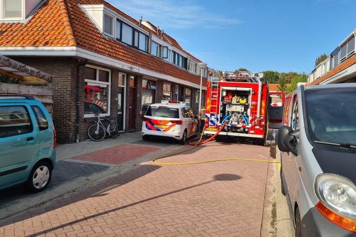 Brand in achtertuin van woning