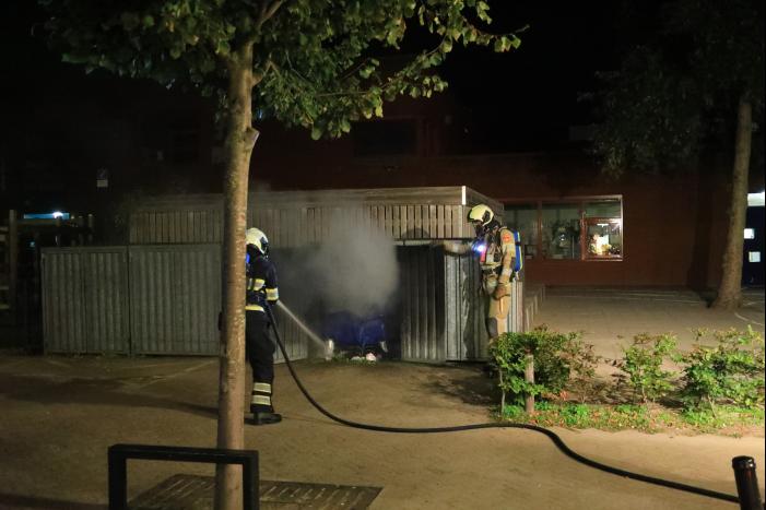 Papiercontainer verwoest door brand