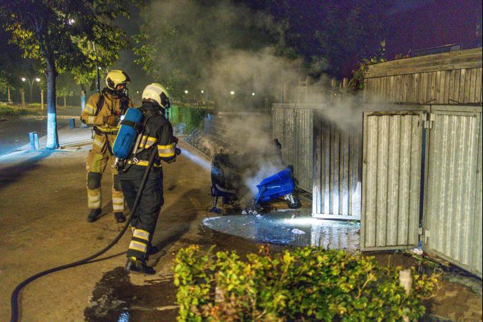Papiercontainer verwoest door brand