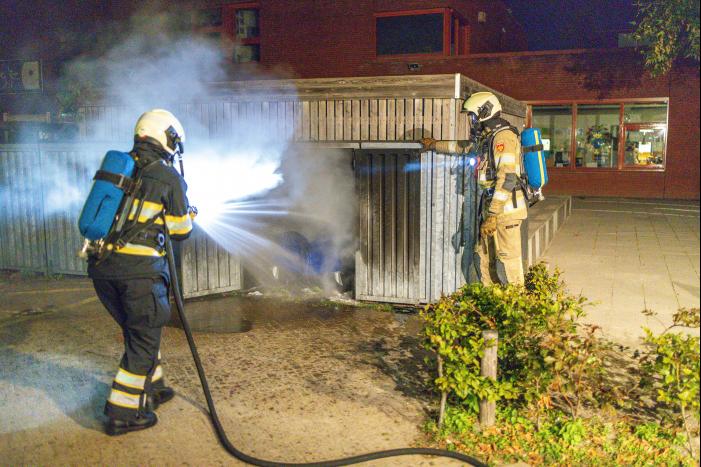 Papiercontainer verwoest door brand