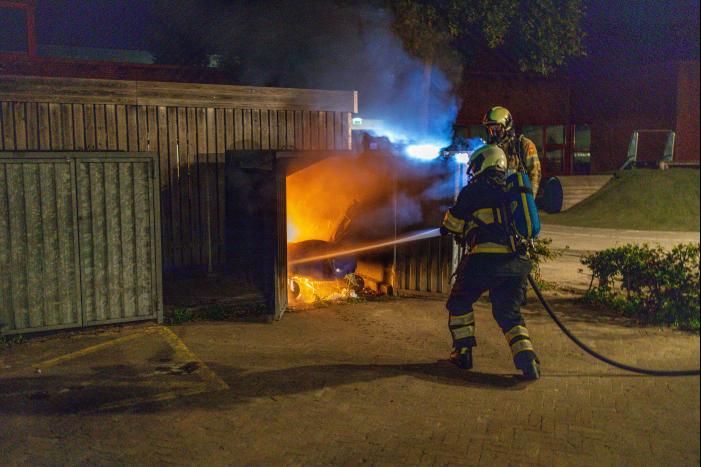 Papiercontainer verwoest door brand