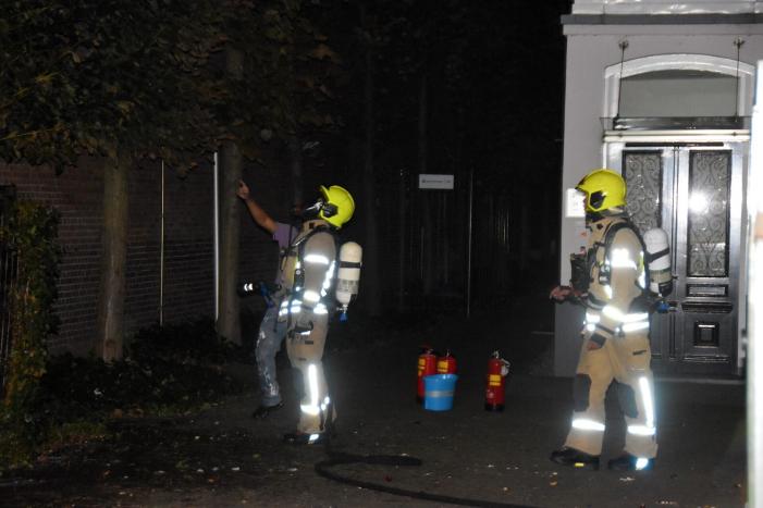 Brandweer blust buitenbrand