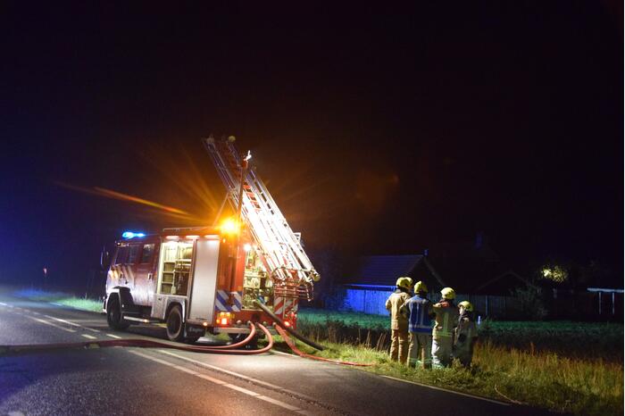 Grote uitslaande brand in loods