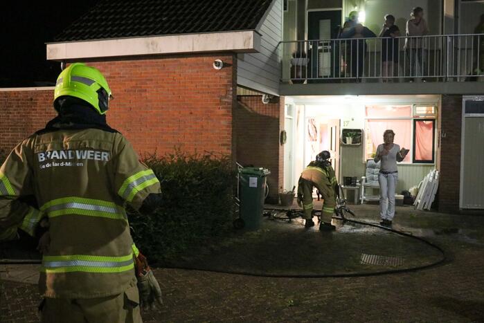 Fiets in brand bij woning