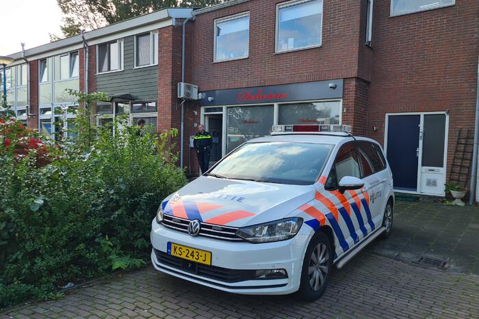 Politie en specialisten doen onderzoek bij Delicious