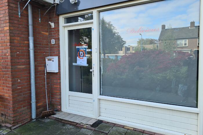 Politie en specialisten doen onderzoek bij Delicious