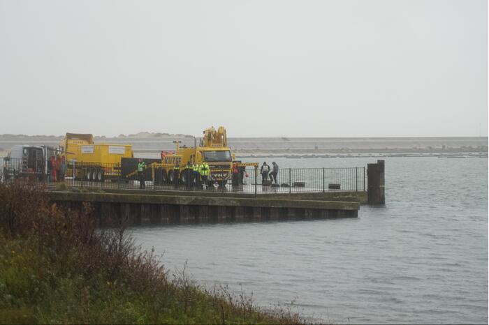 Duikers vinden auto met mogelijk inzittende