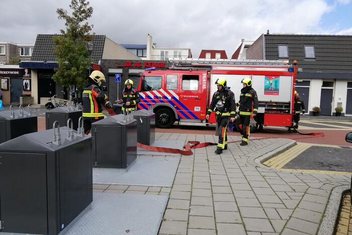 Brand in ondergrondse container