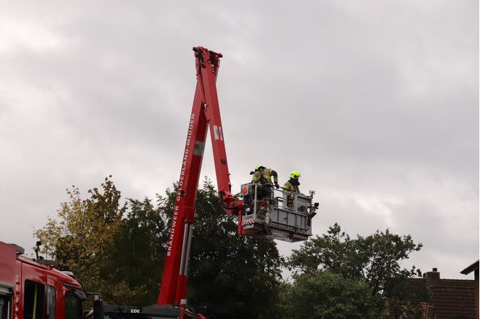 Schoorsteen kap gedemonteerd na schoorsteenbrand