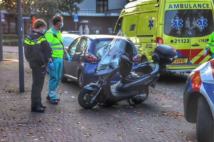 Ongeval tussen auto en scooter