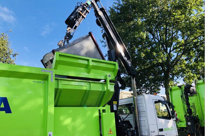 Kraan vuilniswagen breekt af