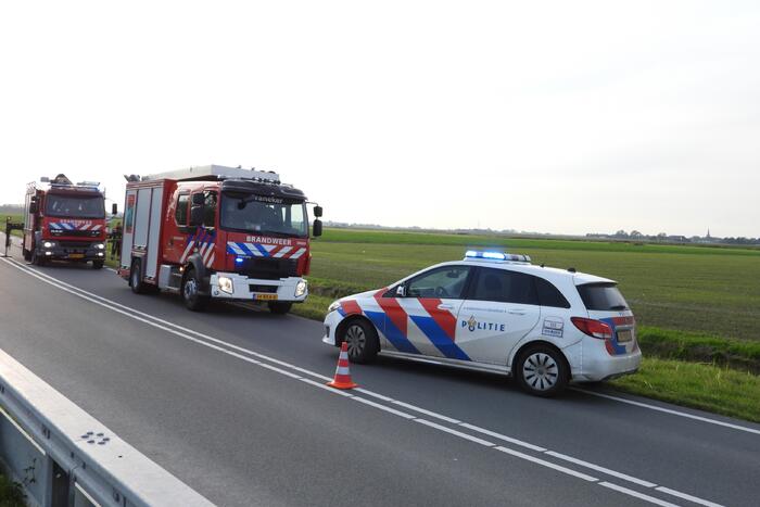 Paard met wagen valt in sloot
