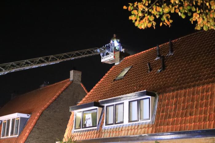 Brand in schoorsteen van woning
