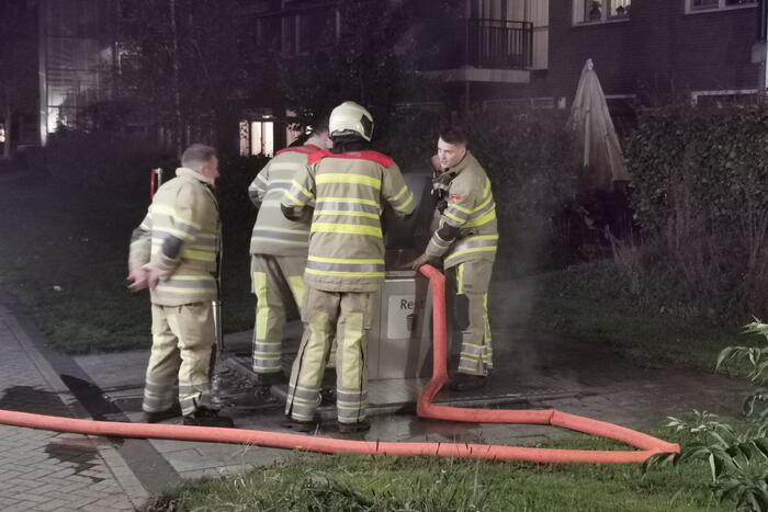 Flinke brand in ondergrondse container