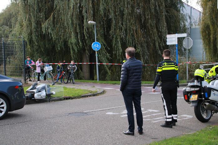 Tesla in botsing met scooter