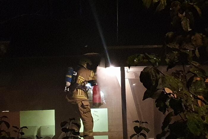 Brand in schoorsteen van woning