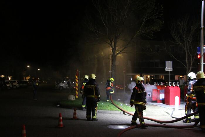 Ondergrondse container in brand