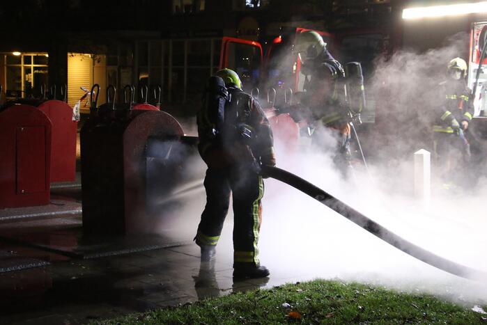 Ondergrondse container in brand