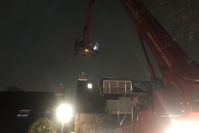 Brand in schoorsteen van woning