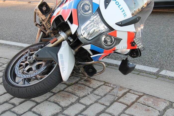 Motoragent aangereden door auto