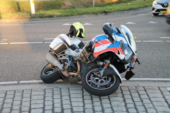 Motoragent aangereden door auto