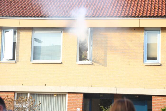 Brand in badkamer van woning